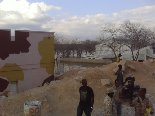 Submerged houses on the shore of a lake in Haitian interior